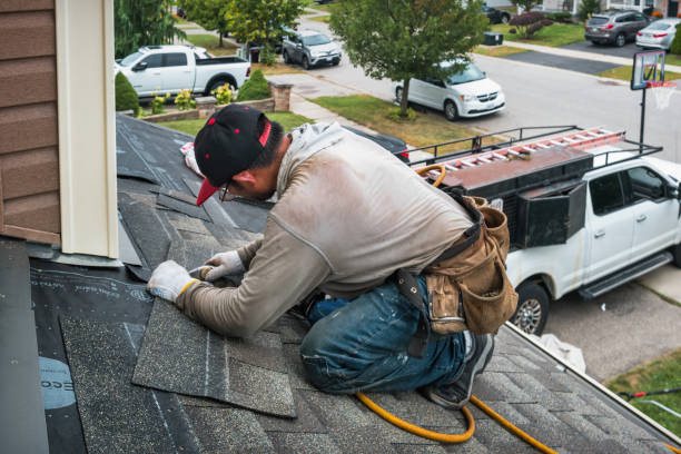 Professional Roofing technician working in Monroe, VA